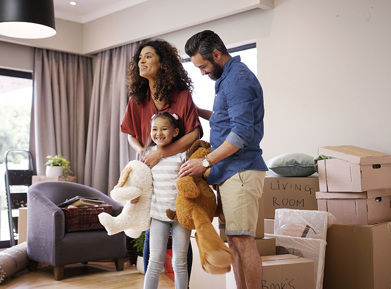 family with moving boxes