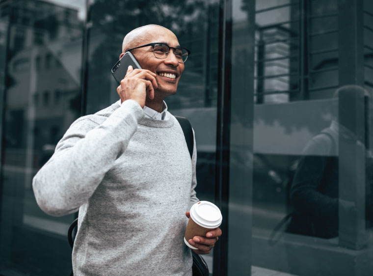 Man walking in the city on the phone