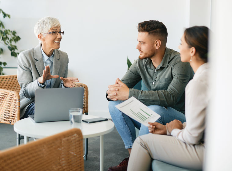 young couple working with advisor